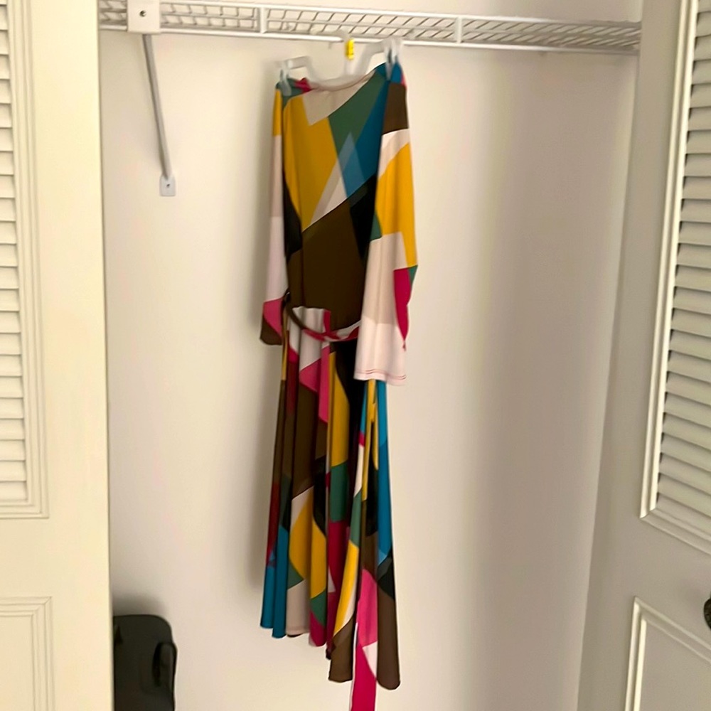 Beautiful dress , bought it at. A Miami store very soft fresh and elegant.